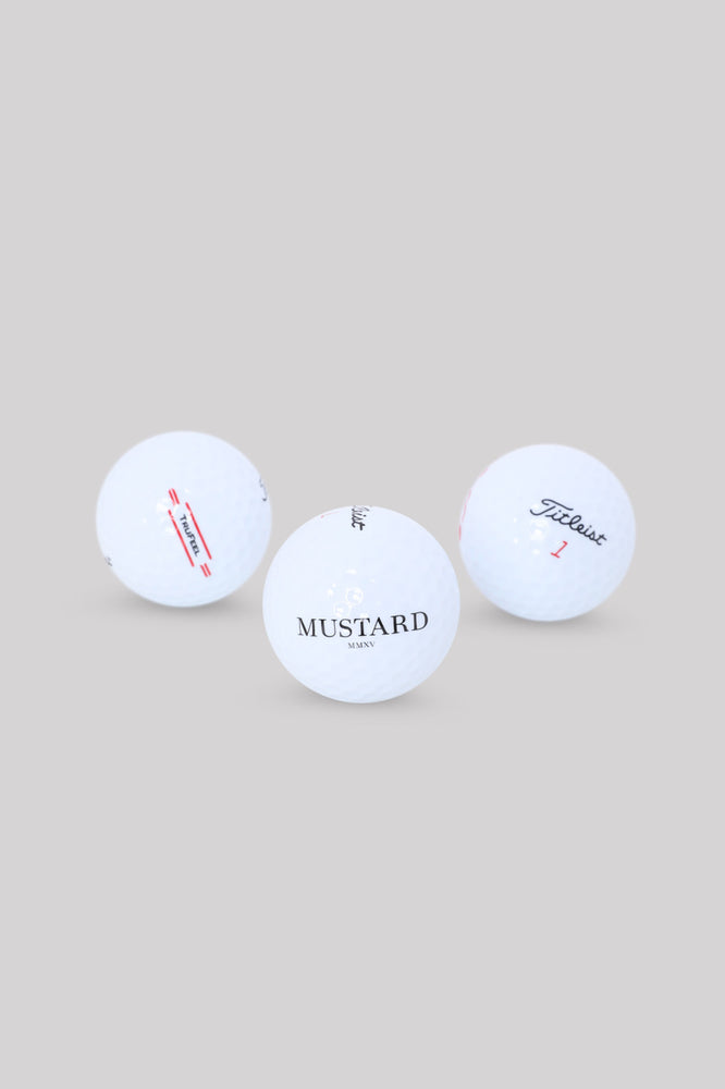 
            
                Load image into Gallery viewer, Mustard x Titleist TruFeel Golf Balls ( 3 Pack)
            
        